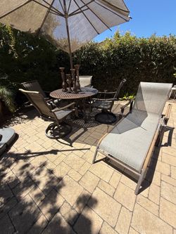 Free Outdoor dining set 4 chairs and lounger
