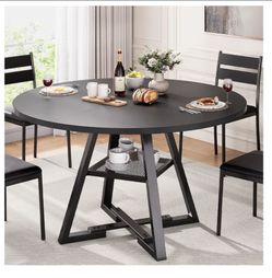 Dinner table with chairs