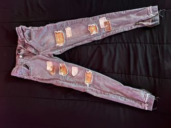 Distressed Skinny Jeans with Leather Patches