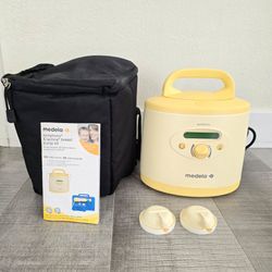 Medela Symphony pump + travel bag