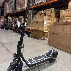 Electric scooter with shock absorption