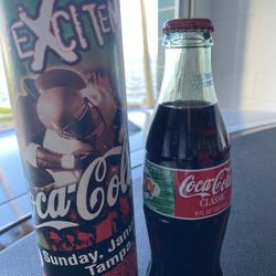 A Total Of 24 Super Bowl XXXV Collective Bottles In Commemorative  Case