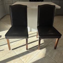 2 Brown Leather Dining Chairs – Nailhead Trim – Solid Wood Legs