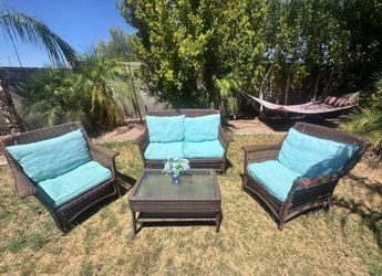 Outdoor vintage wicker 4 seats and a table