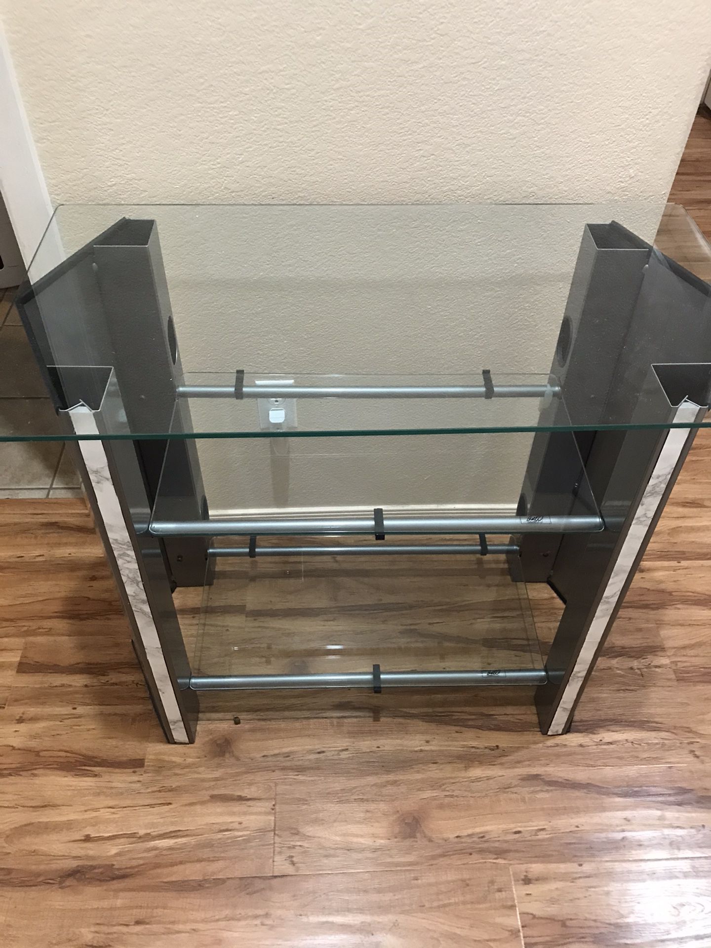 Tv stand glass with shelves.