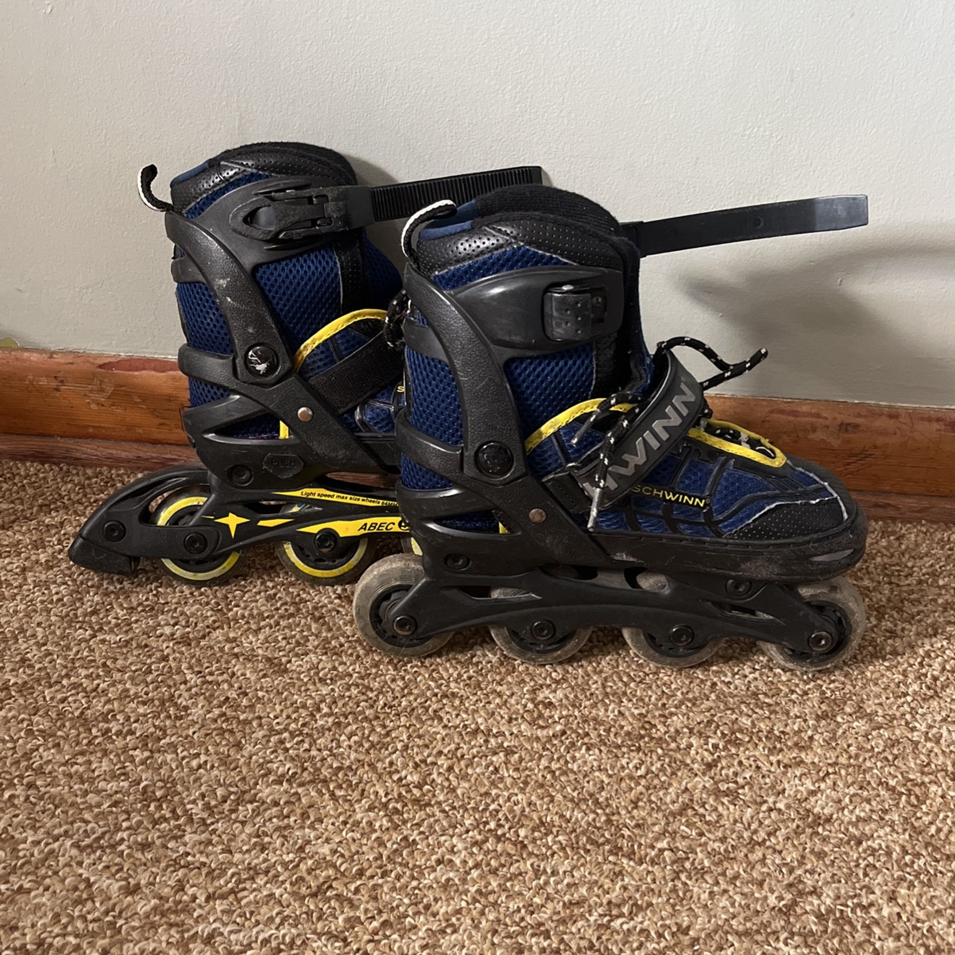 Blue, Yellow, And Black Rollerblades