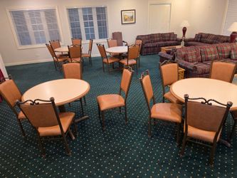 Four 42" round tables and 36 powder coated with marine grade vinyl