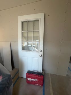 White Exterior Door with 9-Lite Glass