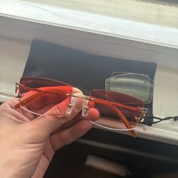 Cartier glasses, red/white lenses gold frames