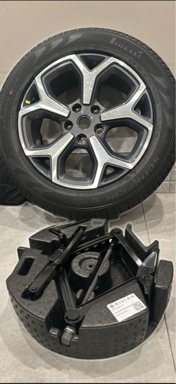 Brand new 21” spare rim and tire change kit for Rivian R1T / R1S