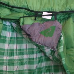 Exxel outdoors  Green Sleeping Bag 33 In X 77 In 100% Polyester. Never Used. New Open Box