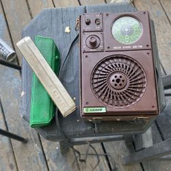 Antique radio and harmonica $20 for the whole package