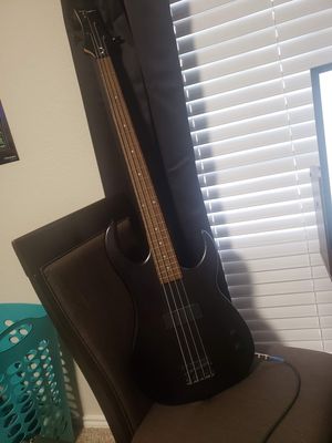 Photo Electric bass guitar and amp