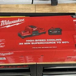 MILWAUKEE M18 BATTERY SUPERCHARGER WITH M18 XC 8.0 FORGE BATTERY.  NEW IN BOX 48-59-1881SC