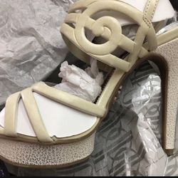 Brand new Jennifer Lopez cream gold heal wedge