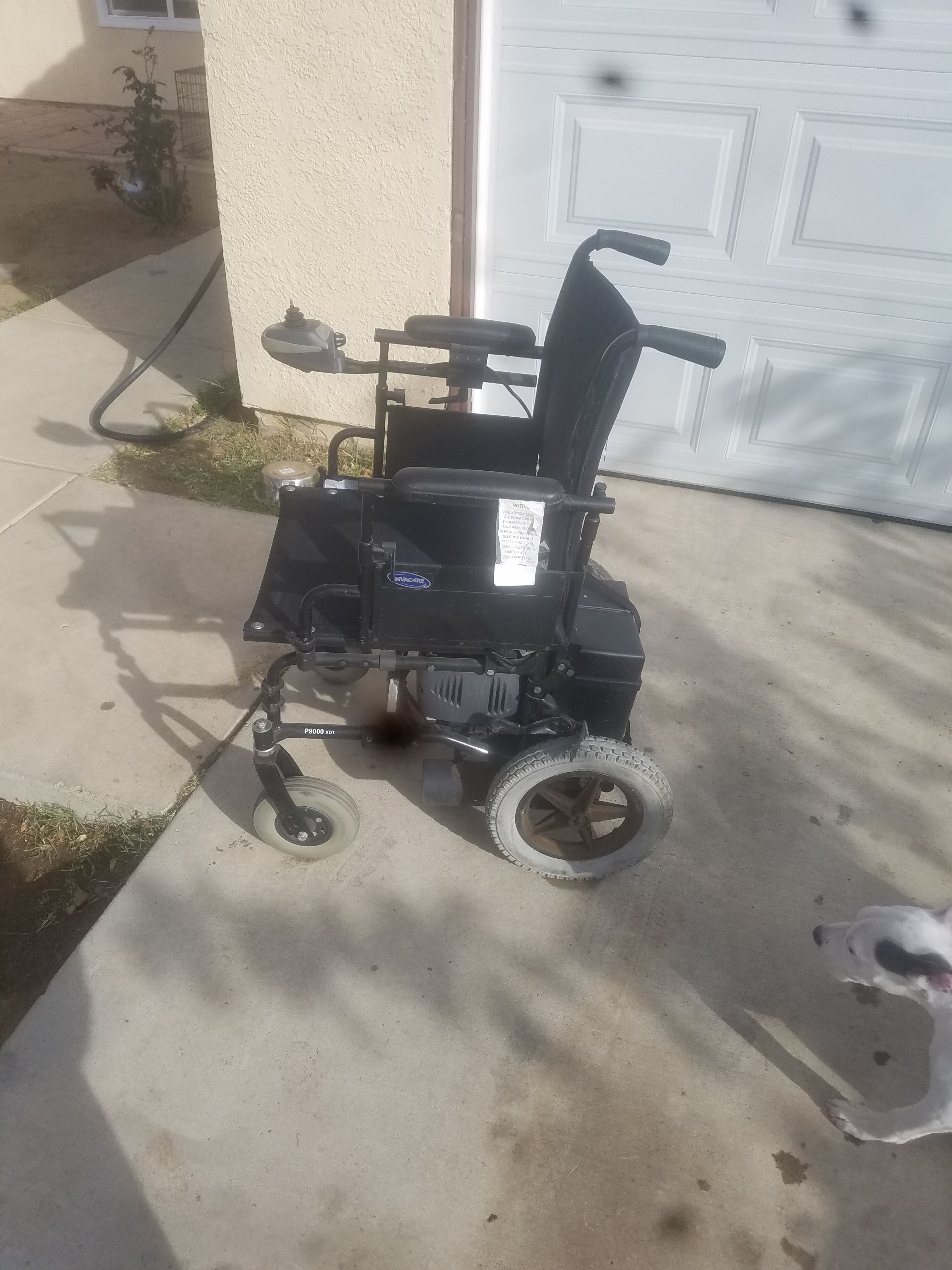 100$ Electric wheel chair needs charger but works