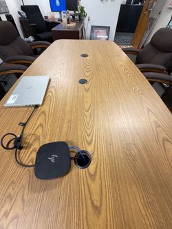Six Lay-Z- Boys chairs and a  Wood Conference Table
