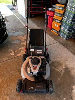 Used-like new Murray self-propelled lawn mower. Engine is 140cc Briggs & Stratton E550 Prime. Cutting width is 22 inches. Has front wheel drive and gr