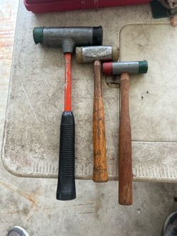 Three dead blow hammers