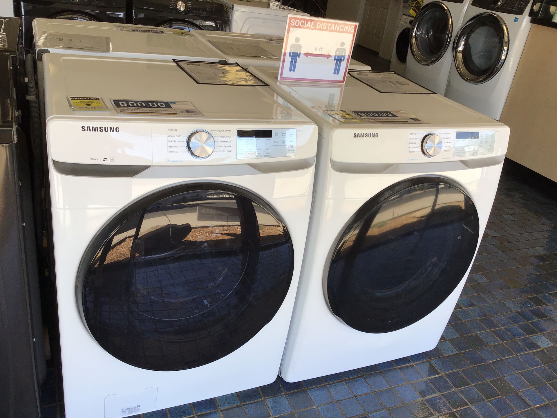 Samsung front load washer and electric dryer in white