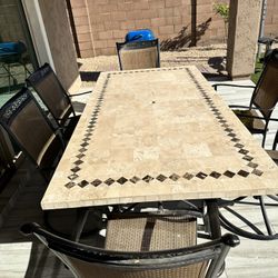  Travertine table with 4 rocking chairs and 2 armchairs 