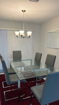 glass dining table with 6 chairs