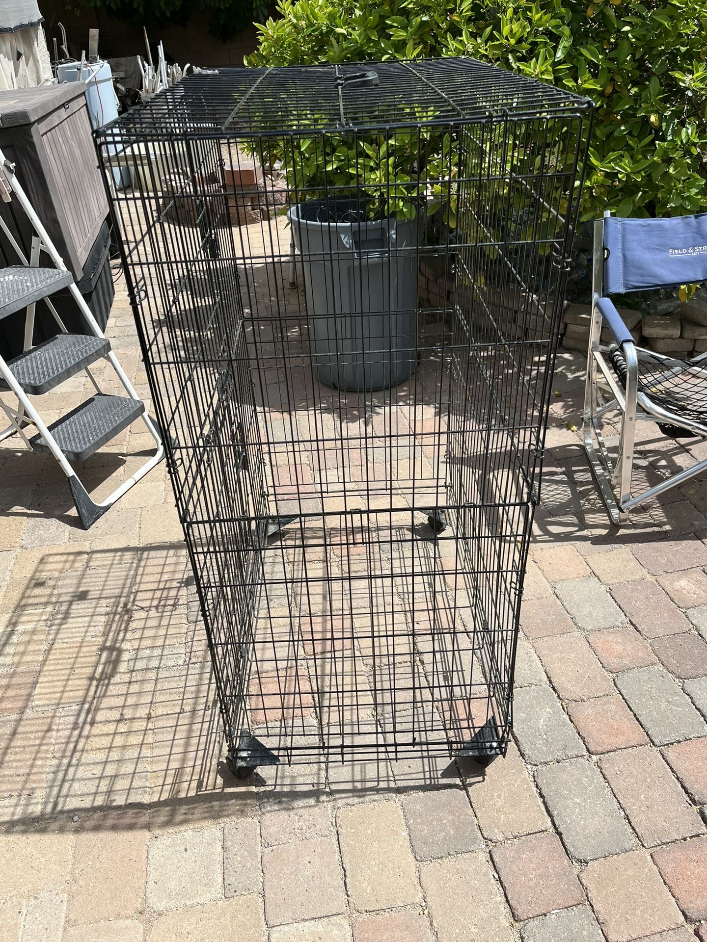 Used Large Bird Cage On Wheels. Folds Up No Bottom Pan.