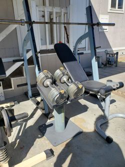 Selling home gym olympic bench press And  a multi-function cable gym machine
