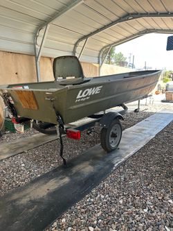 Jon Boat 1440 and trailer