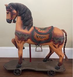 Vintage Antique Hand Carved Wooden Toy Rocking Horse 26” Cast Iron Wheels Brown