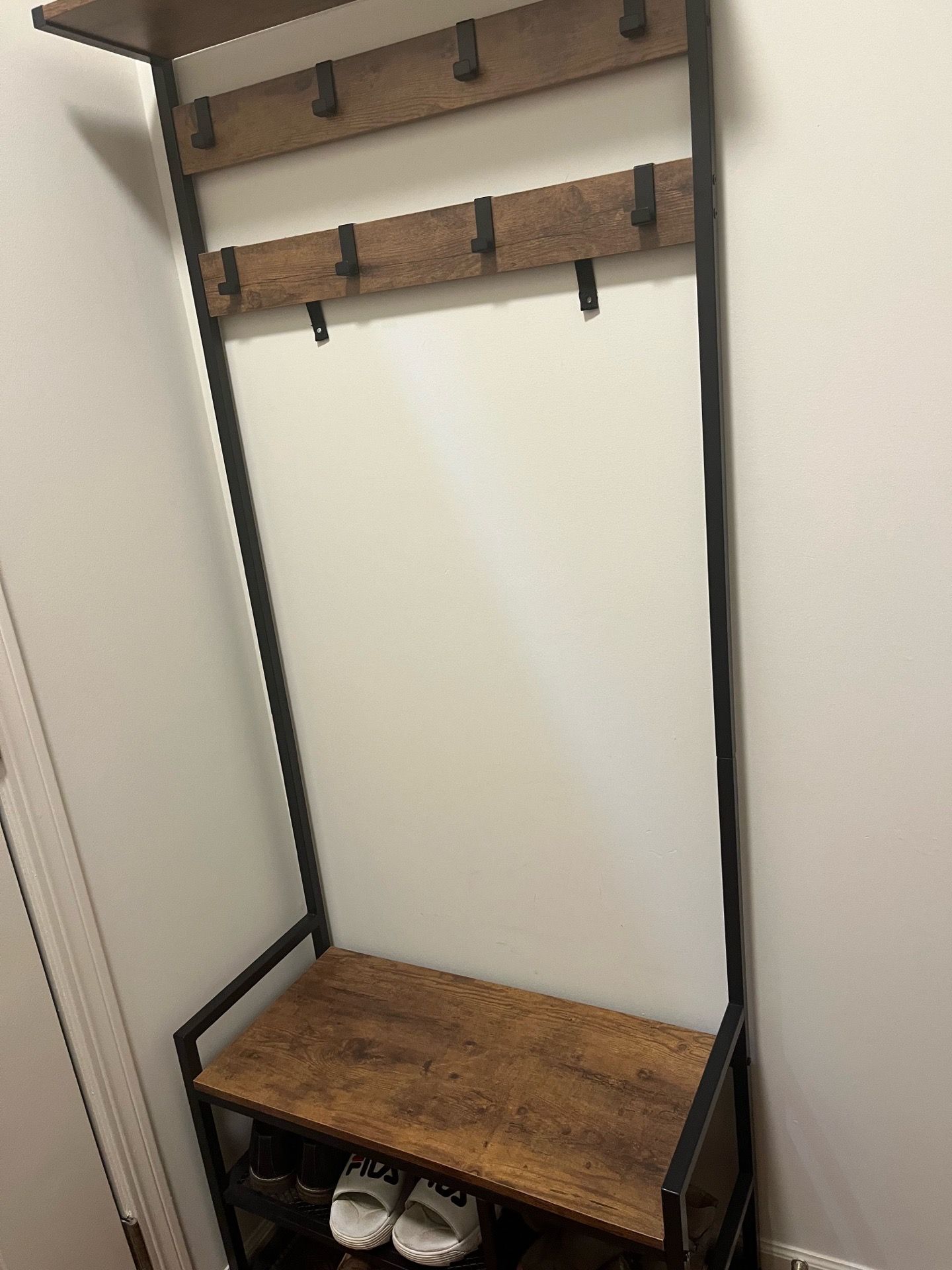 Shoe rack with coat hanger