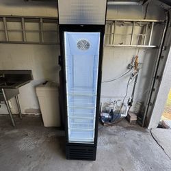 commercial beverage refrigerator with a glass door.
