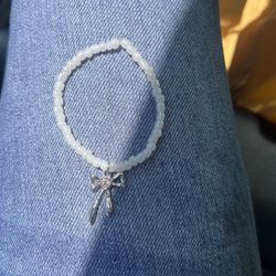 Pretty White Bracelet With A Pink Heart In The Bow