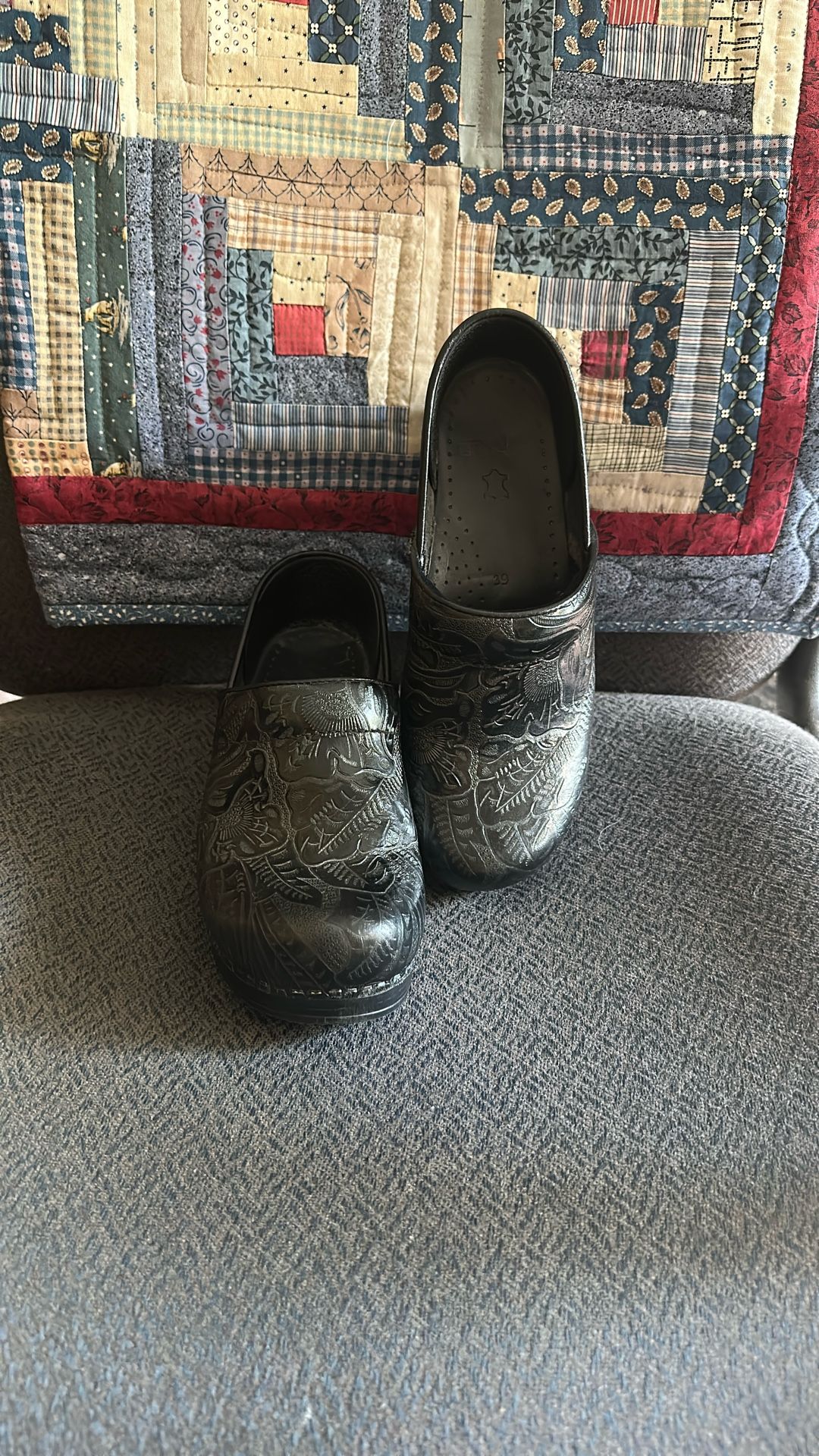 Dansko Black Leather Tooled Clogs