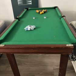 Mini Pool Table With A Variety Of Different Boards