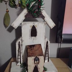 Farmhouse Wooden Chapel And Barns With Wreaths