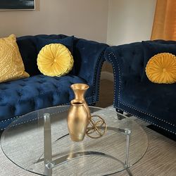 deep navy-blue tufted sofas