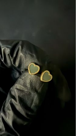14K gold heart stud earrings with green heart inlay.