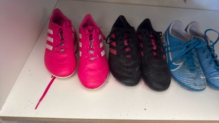 Pink soccer shoes