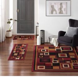 Area Rug 3 Piece Set (4'11" x6'11,1'8" x4'11,1'8" x2'8), Geometric Red  3 piece set  Brand new  Only pickup 
