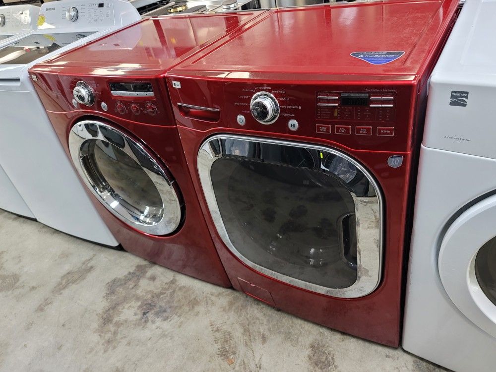 Red LG Front Load Washer And Stackable Gas Dryer Set