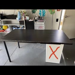 Black Ikea Table Top With Only Two Legs 