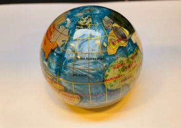Stunning natural gemstone globe paperweight by Kalifano