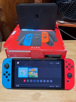Nintendo  Switch OLED  + extras