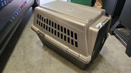 Small to medium sized dog Kennel. $30 price is firm.