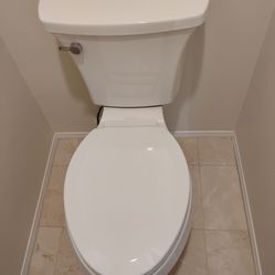 1-yr old KOHLER Elongated Toilet Intrepid adult comfort height 2-piece *perfect cond - installation avail* soft close seat wax ring and all hardware