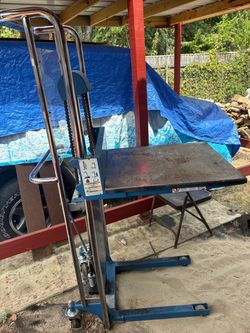6 ft high stacker with platform and forks $350