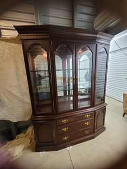 Cherry wood two piece China hutch/display cabinet