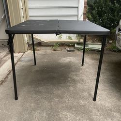 Camping adjustable table