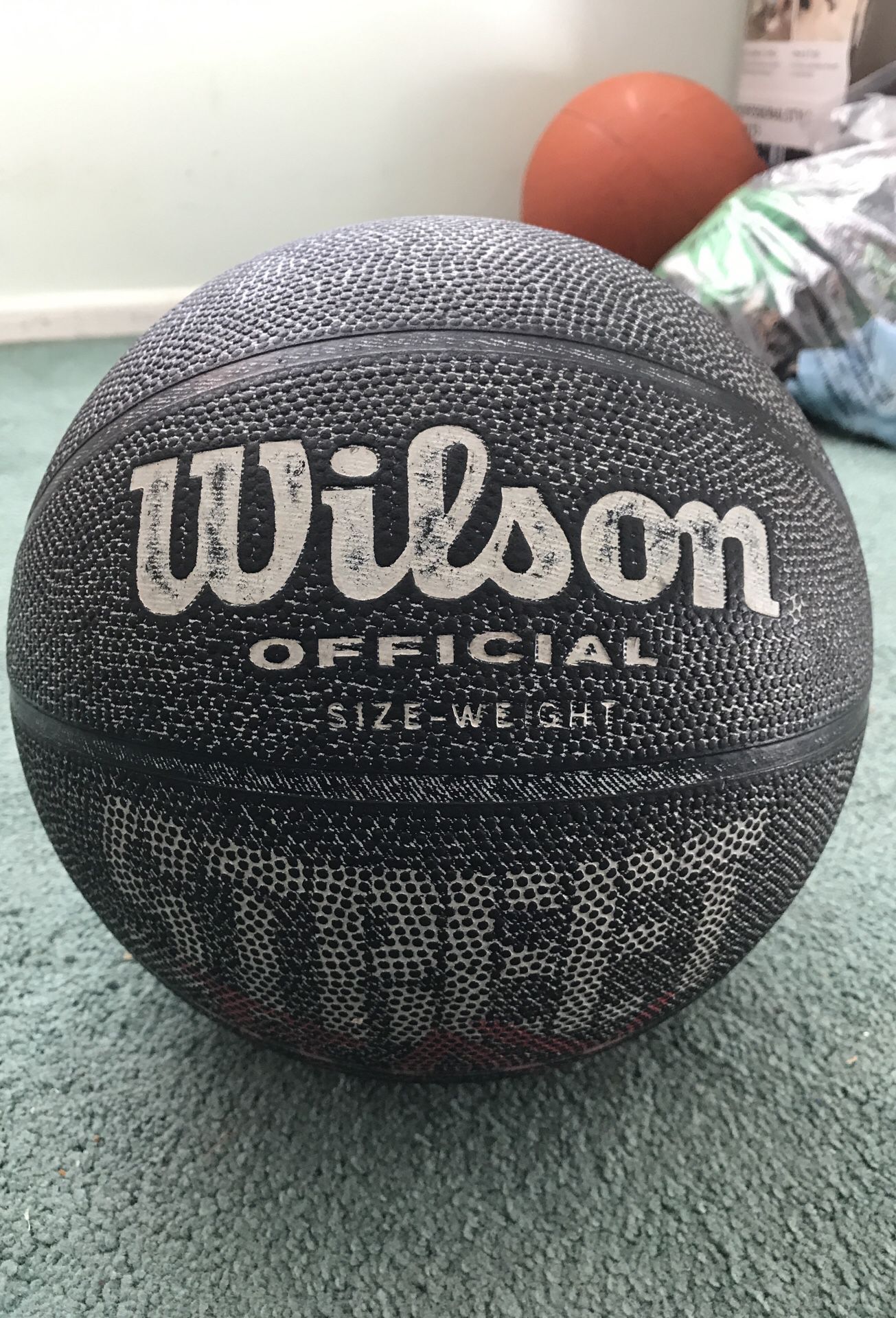 This Wilson basketball was used but is still in a new condition.